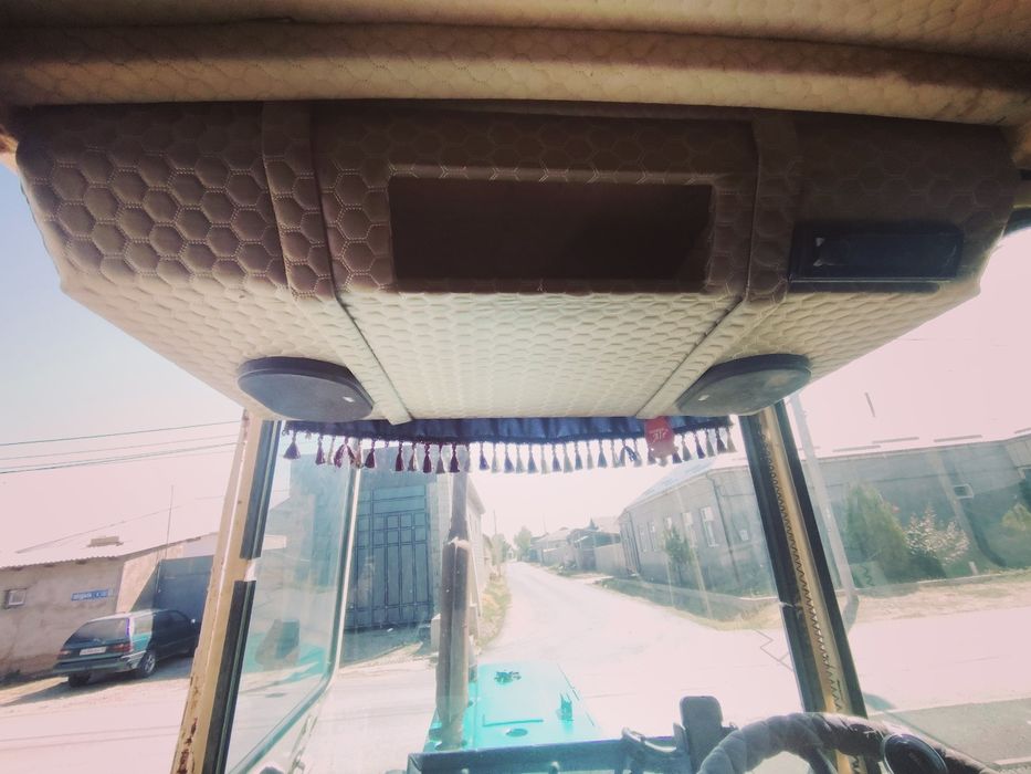 Трактор ЮМЗ с пресс подборшиком