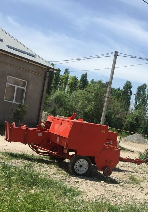 Трактор ЮМЗ с пресс подборшиком