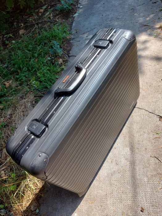 Rimowa valiza troller geamantan