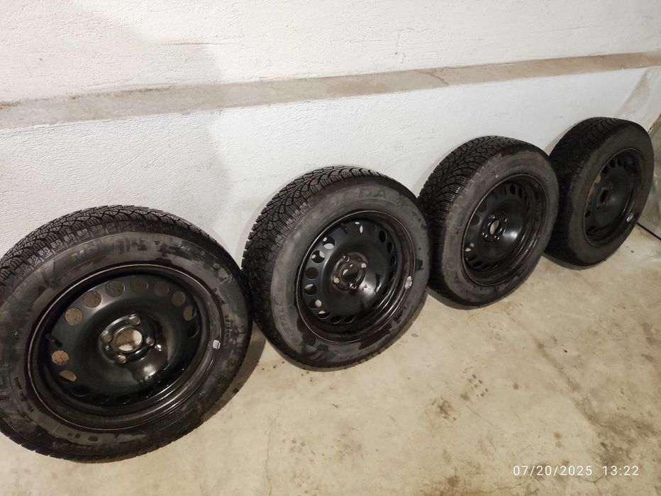 Зимни гуми Fulda 185/65/15 с железни джанти за Opel Corsa D и тасове