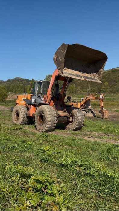 Продам погрузчик Hitachi LX 230