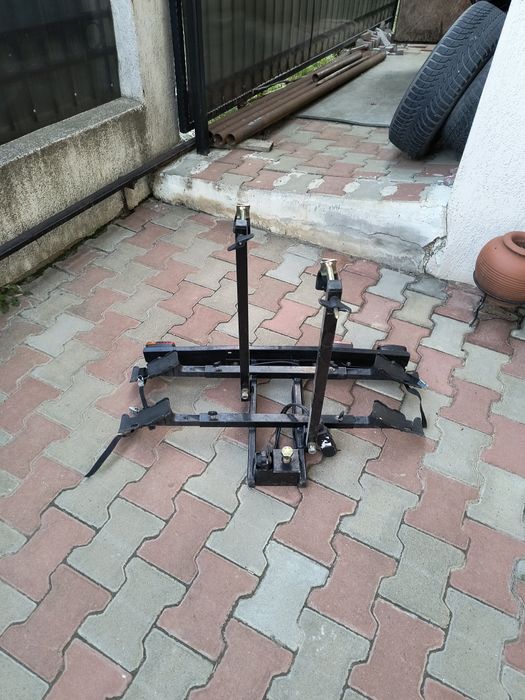 Suport bicicleta pe carlig