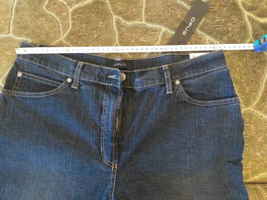 Джинсы новые