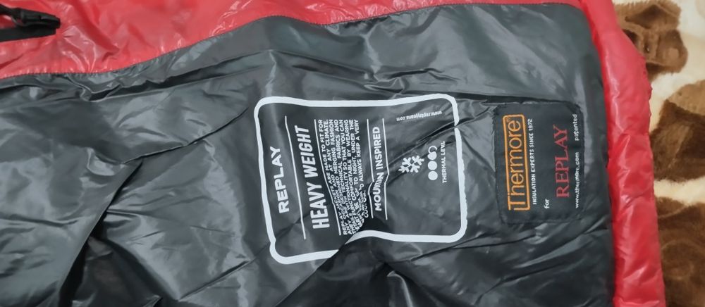 фирменный пуховик