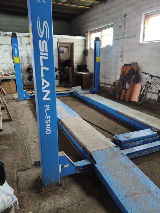 Подъёмник четырех стоечный