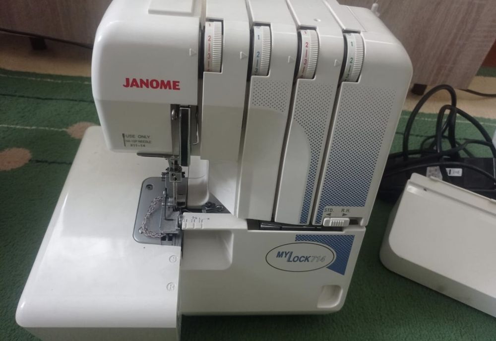Оверлок janome 714