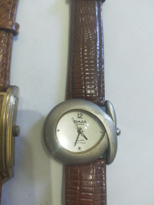 "Часы" - *OMAX*.