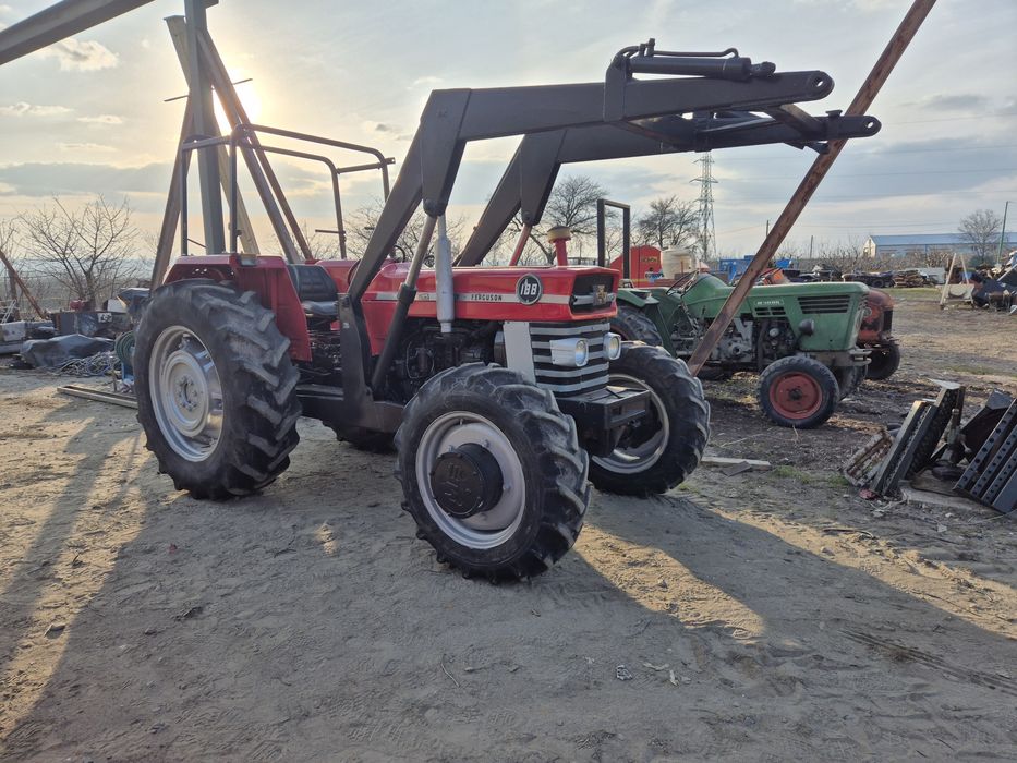 Tractor dubla tracțiune cu încărcător 88 cai.