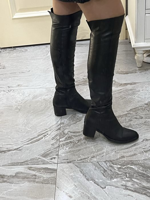 Стильные высокие сапоги