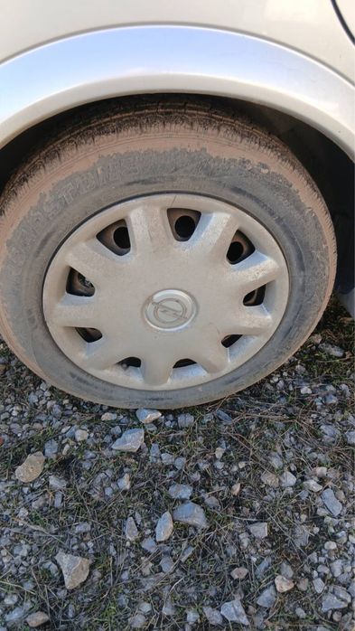 Оригинални метални джанти от Opel 4x100 със зимни гуми 185/65/15