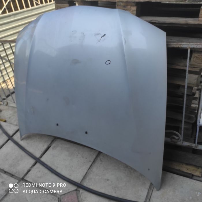 Продам капот на Мазда 626 птичка рестайлинг.