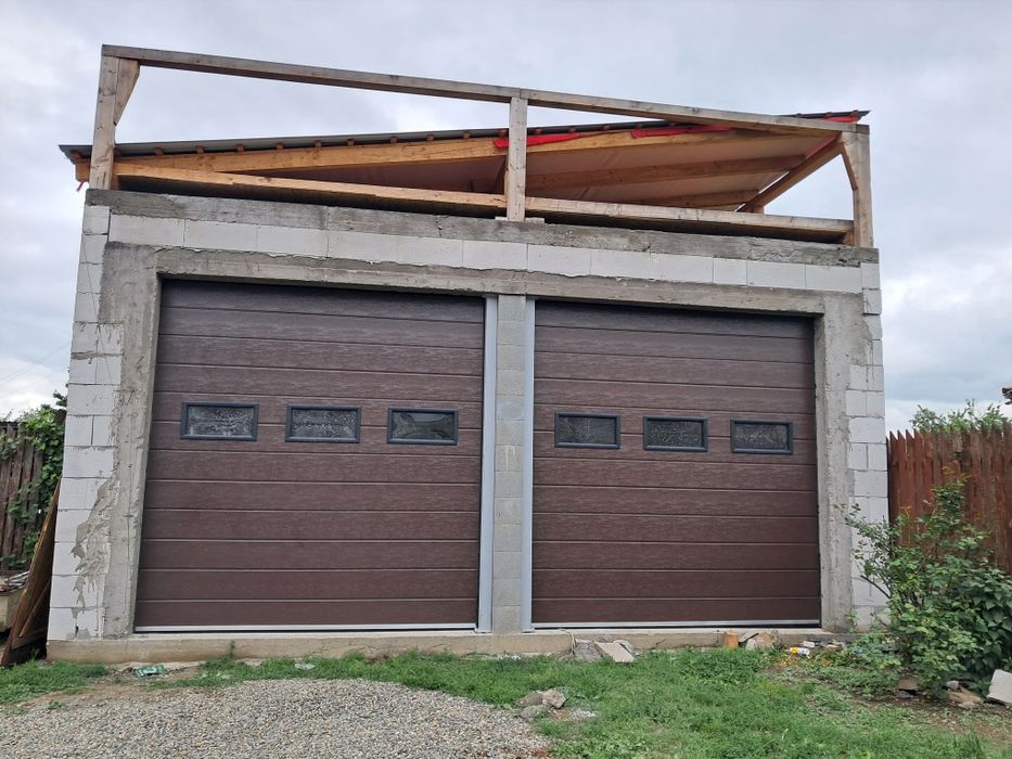 Usa de Garaj: ...nu scârțâie,  doar șoptește..!