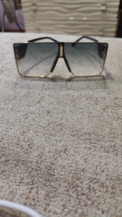 Очки солнцезащитные авиатор.