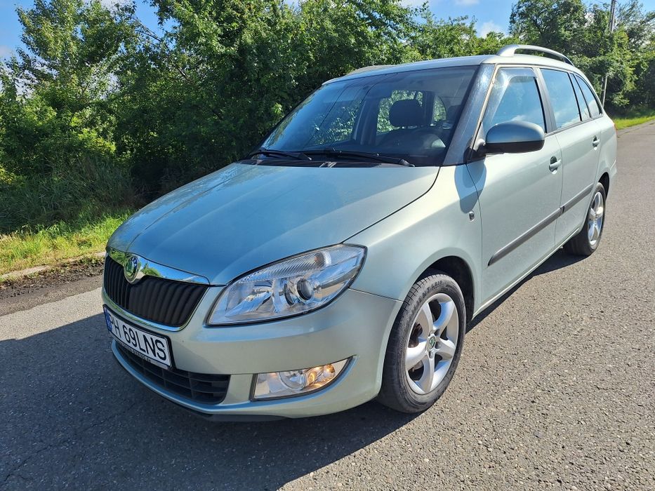Skoda Fabia Greenline 2011  1200 cm TDi 90 cp  clima navi jante  Propietar