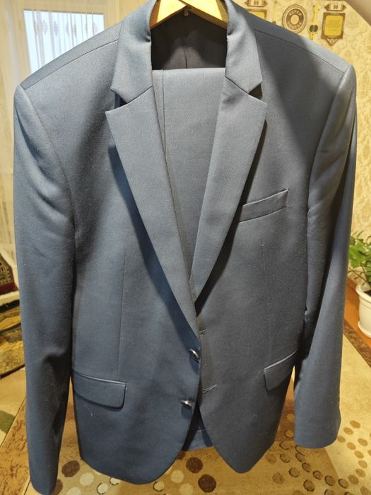 Костюмы фирменные