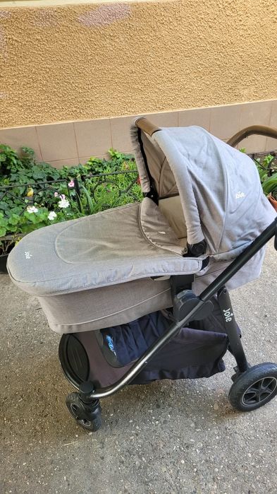 Carucior pentru copii 3 in 1 Joie Versatrax plus Scaun auto I-Venture pentru 0-18 kg si baza ISOFIX compatibila atat cu scoica cat si cu scaunul