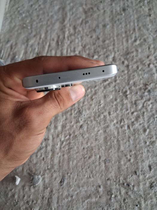 Xiaomi HyperOS ..