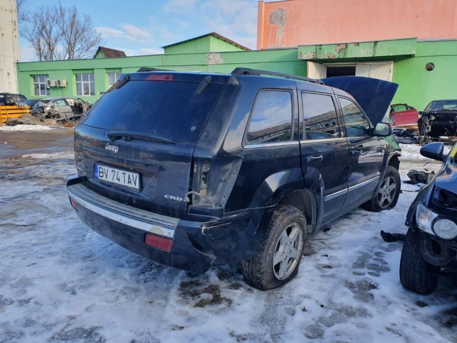 dezmembrez Jeep Grand Cherokee 4x4 motor 3.0cdi dezmembrari  portiera fata spate cutie de transfer