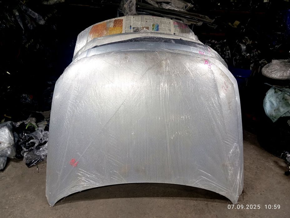 Капот Volkswagen Passat B6