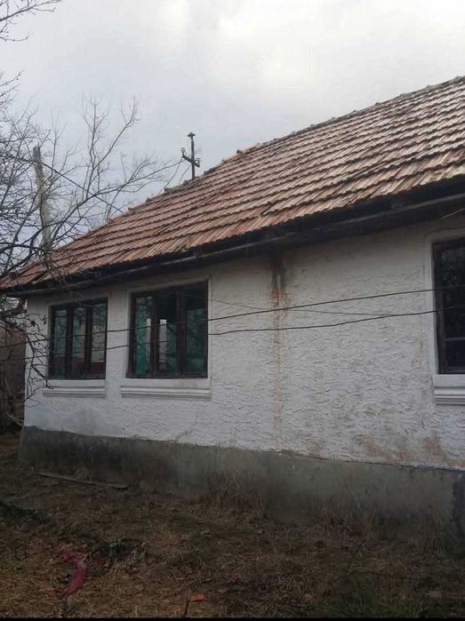 Tereren intravilan cu casa degradata