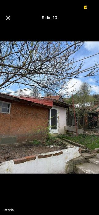 Casa cu 5 camere, curte mare, acces asfaltat