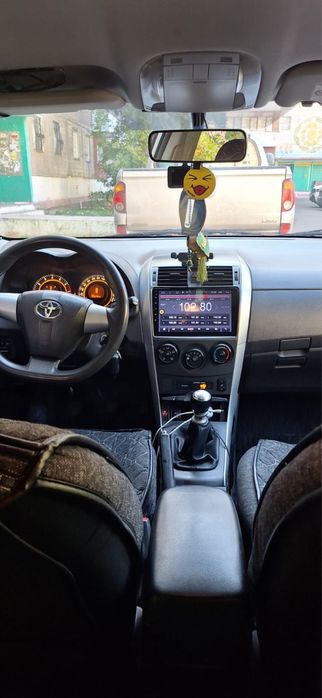 Тайота каролла серого цвета