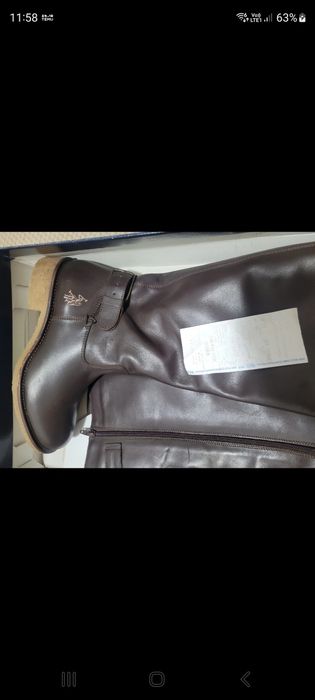 Cizme noi cu eticheta