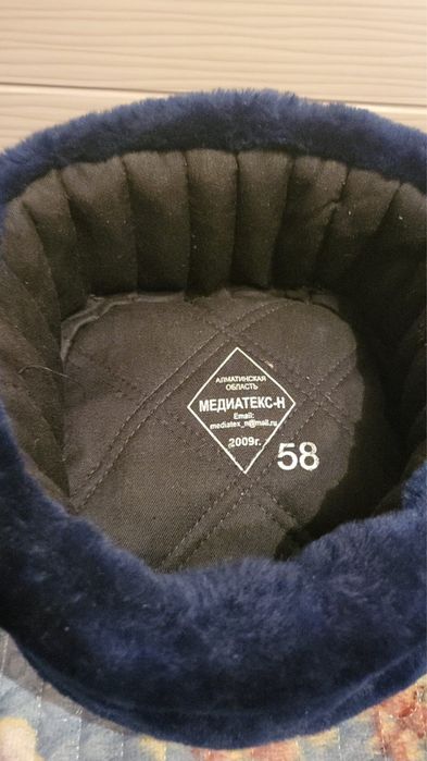 Продам шапки одна цигейковая