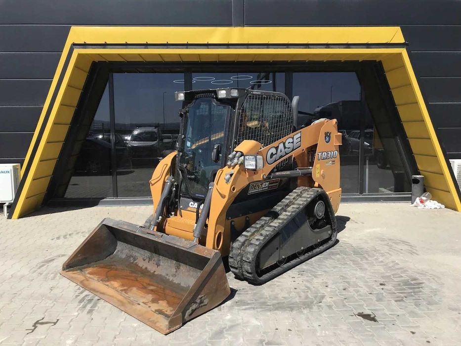 Верижен мини челен товарач 3900 кг. Case TR310