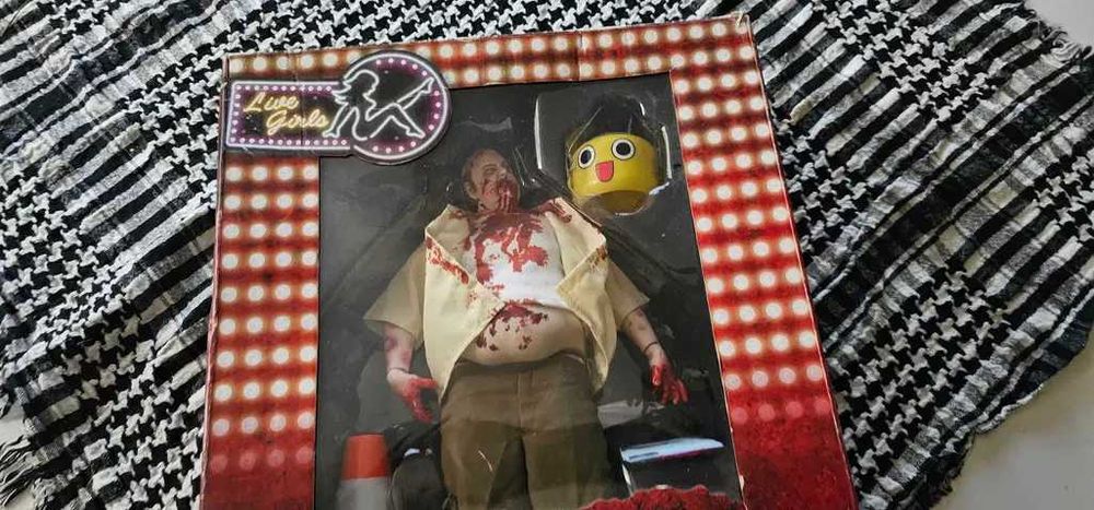 Figurina papusa din jocul dead rising 2