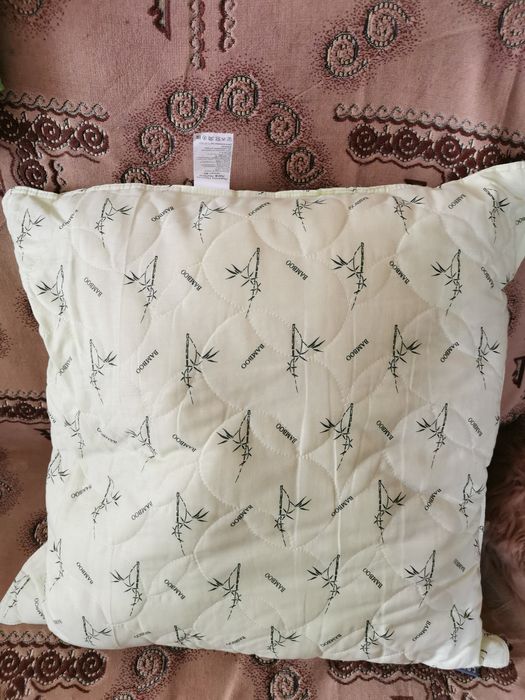 Подушка новая 70*70