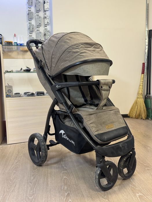 Прогулочная детская коляска