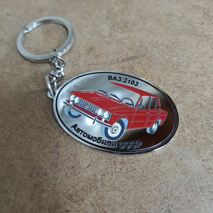 Брелоки в виде эмблем продам