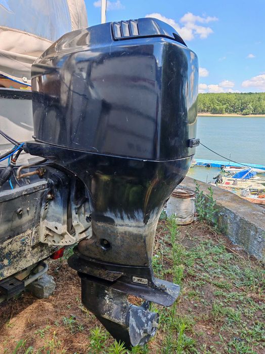 Barca cu motor outboard si peridoc cu punte dubla