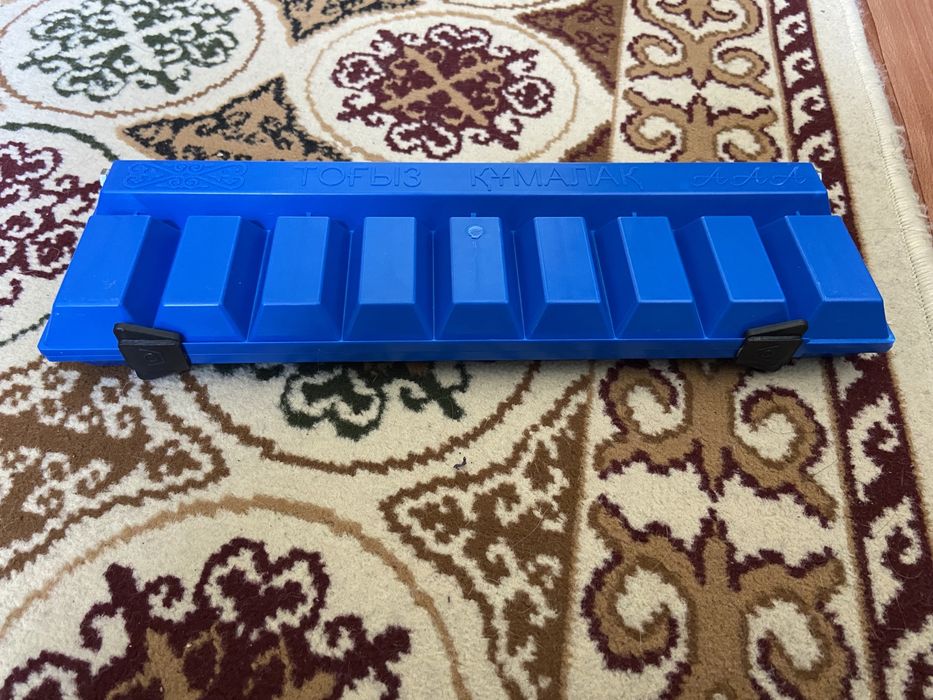 Игра тогыз кумалак