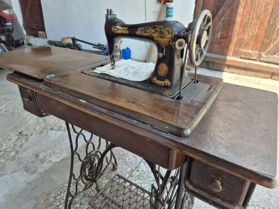 Mașină de cusut Singer