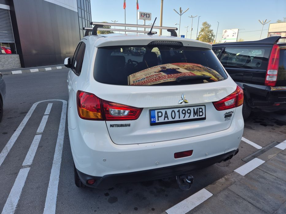 Mitsubishi AXS 2013год.