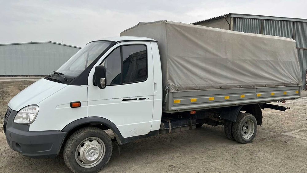 Газель  бортовой тентованный 330202