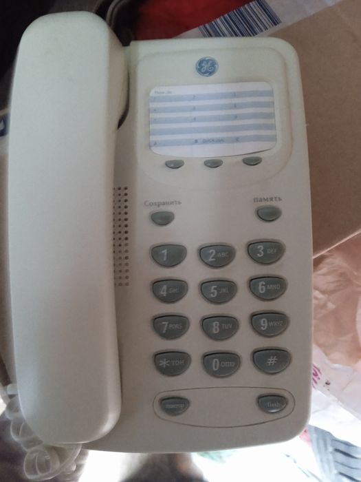 Радиотелефон Panasonic и стационарный телефон