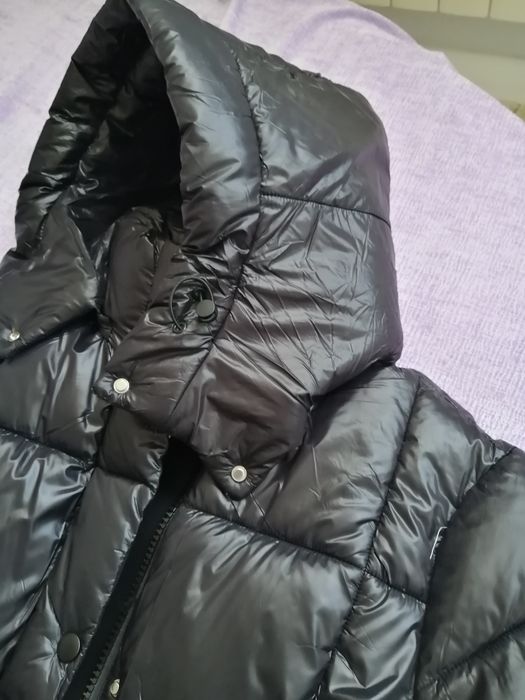 Продам новый пуховик ( Kimex)