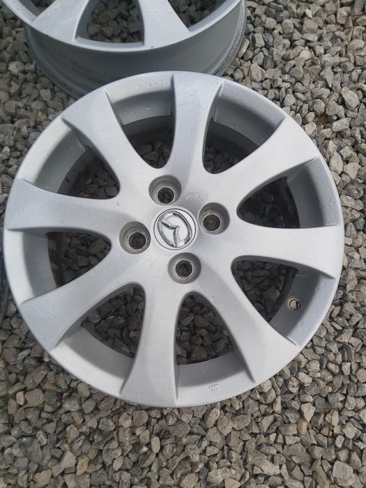 4x100..15.цола.6j ET45..оргинални Mazda