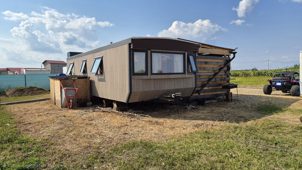 Teren 750 m.  si casa mobila