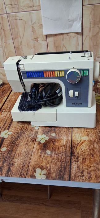 Masina de cusut nechi 559