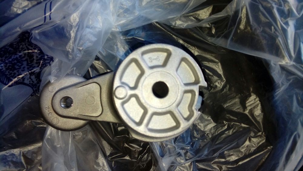 Натяжитель ремня