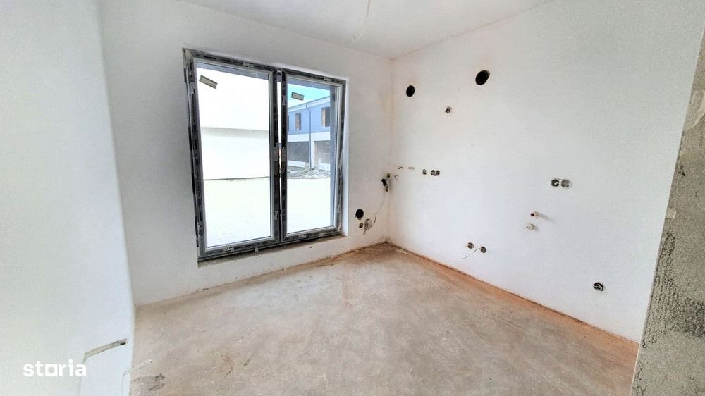 Casa 120 mp cu teren 260 in Tropini