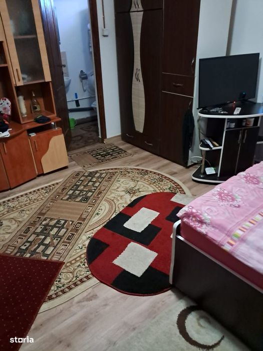 Casa cu 2 camere, teren 1000 mp, acces asfaltat