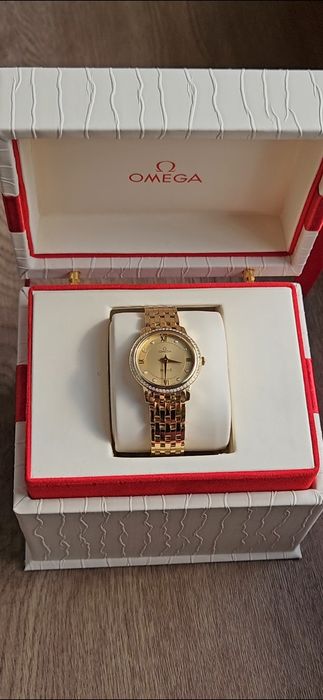 Бренд OMEGA золотые часы 750 пробы с бриллиантами