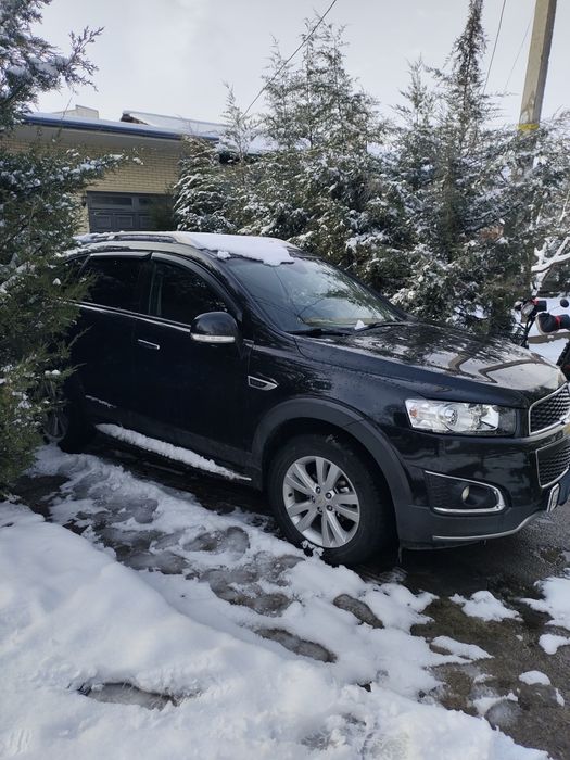 Captiva 2015 Y kraskasi toza xatto banferlayam toza benzinda avtomat .