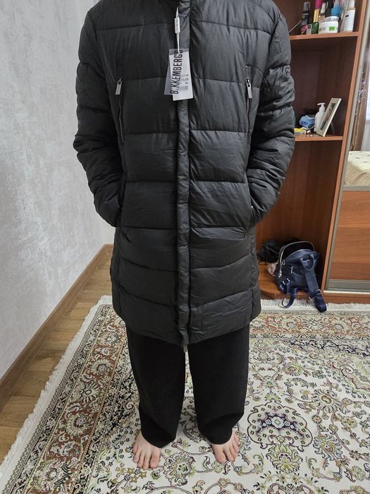 Продам пуховик новый