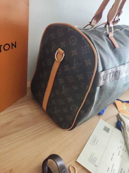 In stoc voiaj, geanta sport piele Louis Vuitton 1109.7